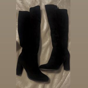 Knee high boots never used. Size 38